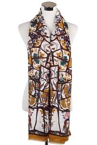Wisteria London Ivy Abstract Floral Print Scarf. Mustard bold abstract branches and floral print frayed scarf. Also available in Grey and Navy Blue
