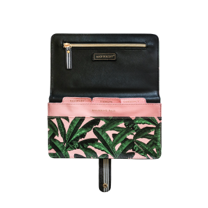 Alice Scott Travel Document Wallet, Travel Document Holder and Passport Holder. The must have travel accessory. This handy travel wallet will store your passport, boarding card, currency, tickets and any spare change you may have. Adrned in a beautiful pink and banana leaf print the front of the travel wallet feautures the words 'Out of Office' in gold foil detailing