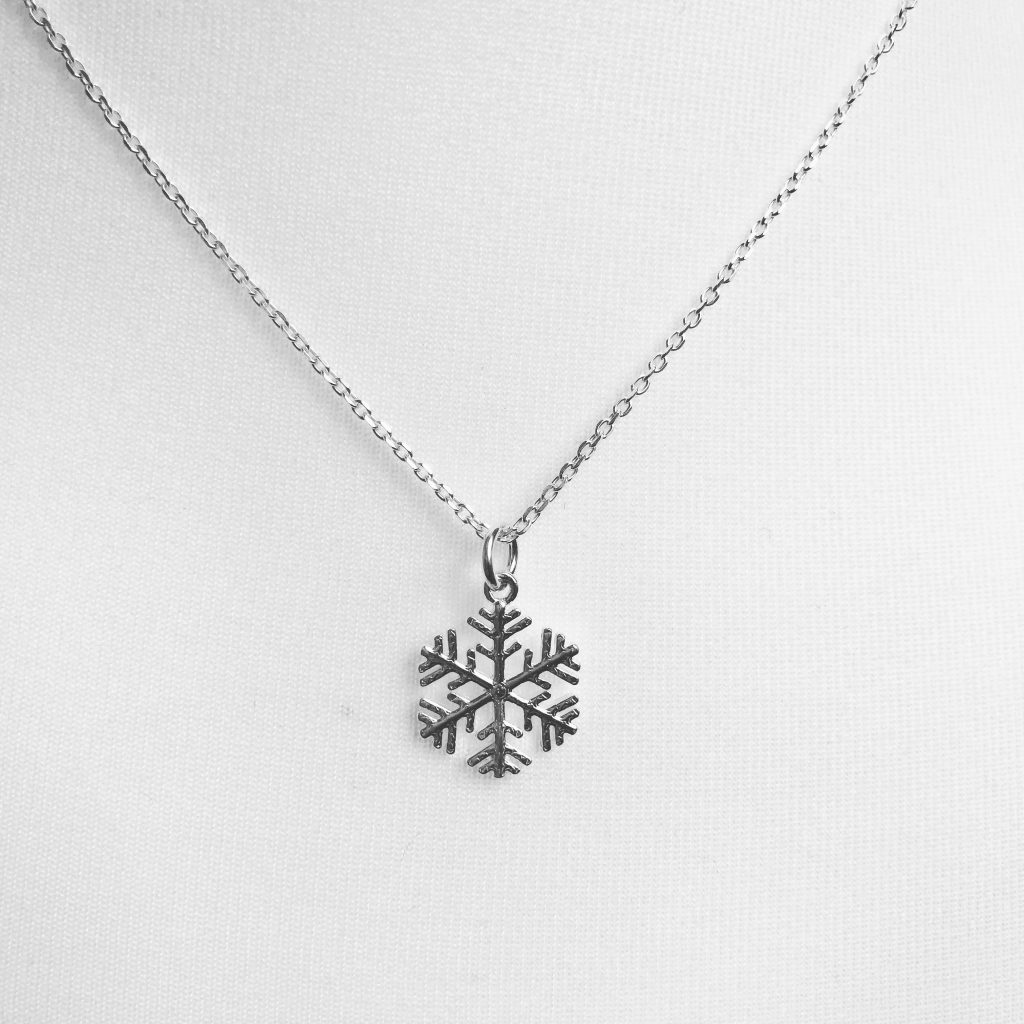 Sterling Silver Snowflake Necklace on a 18" diamond cut cable chain. Also available on an 18" sterling silver bobble chain