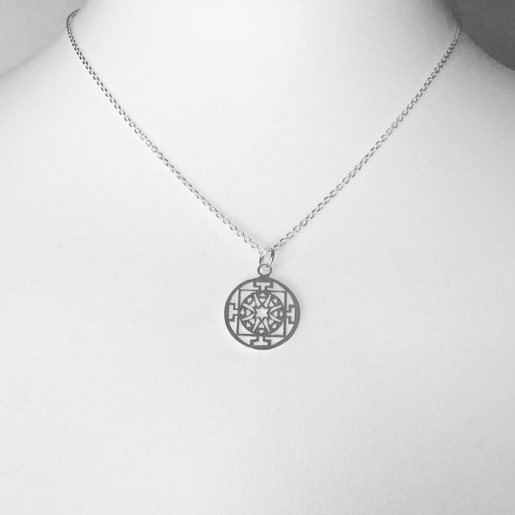Sterling Silver Round Filigree Necklace. Available on a 16" and 18" chain